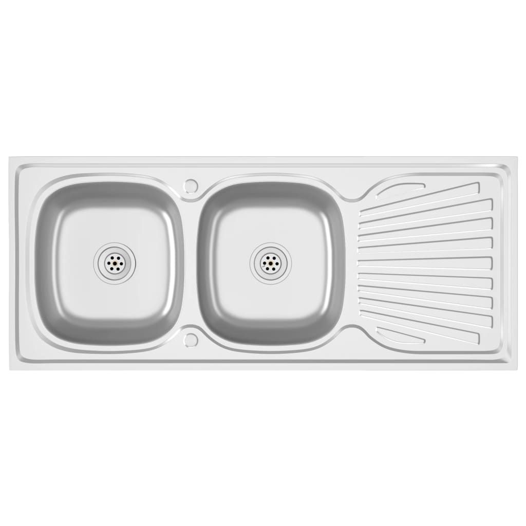 A top-down view of a stainless steel double kitchen sink with a draining board.