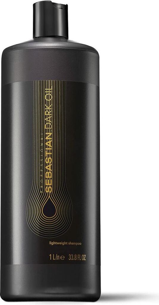 A black bottle of Sebastian Dark Oil Shampoo with gold lettering and design.