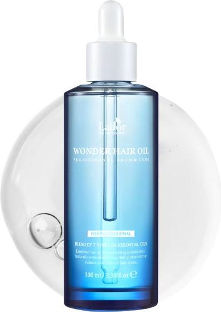 A bottle of La'dor Wonder Hair Oil with a dropper, presented on a white background with a clear liquid overlay.