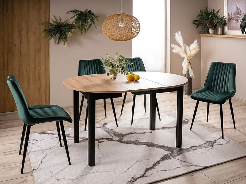 A dining table with chairs in a room setting.