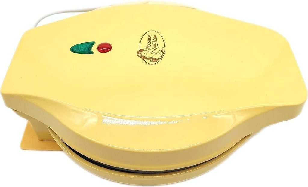 A yellow waffle maker is shown against a white background.