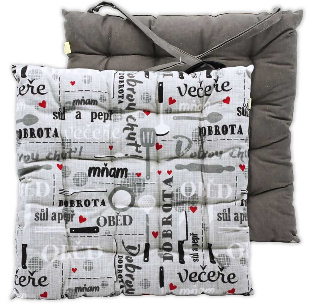 Two seat cushions are shown, one on top of the other. The top cushion has a patterned fabric with kitchen-related illustrations and text. The bottom cushion is a solid gray color.