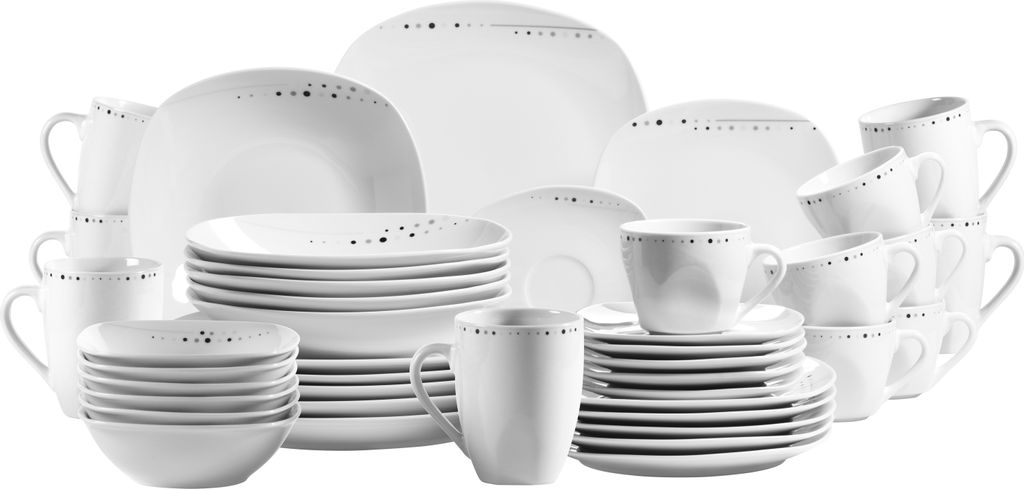 A collection of white ceramic dinnerware with a subtle dotted pattern around the rim.