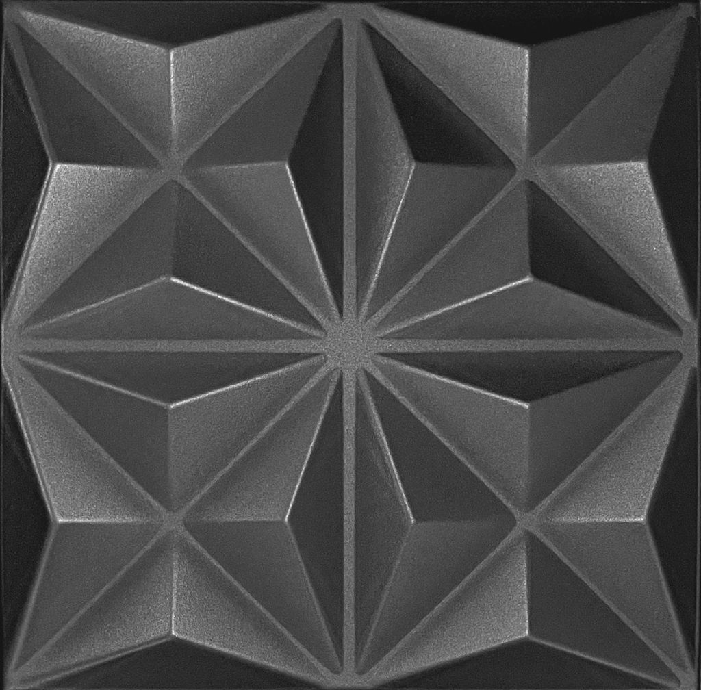 A close-up, textured, geometric pattern on a dark background.