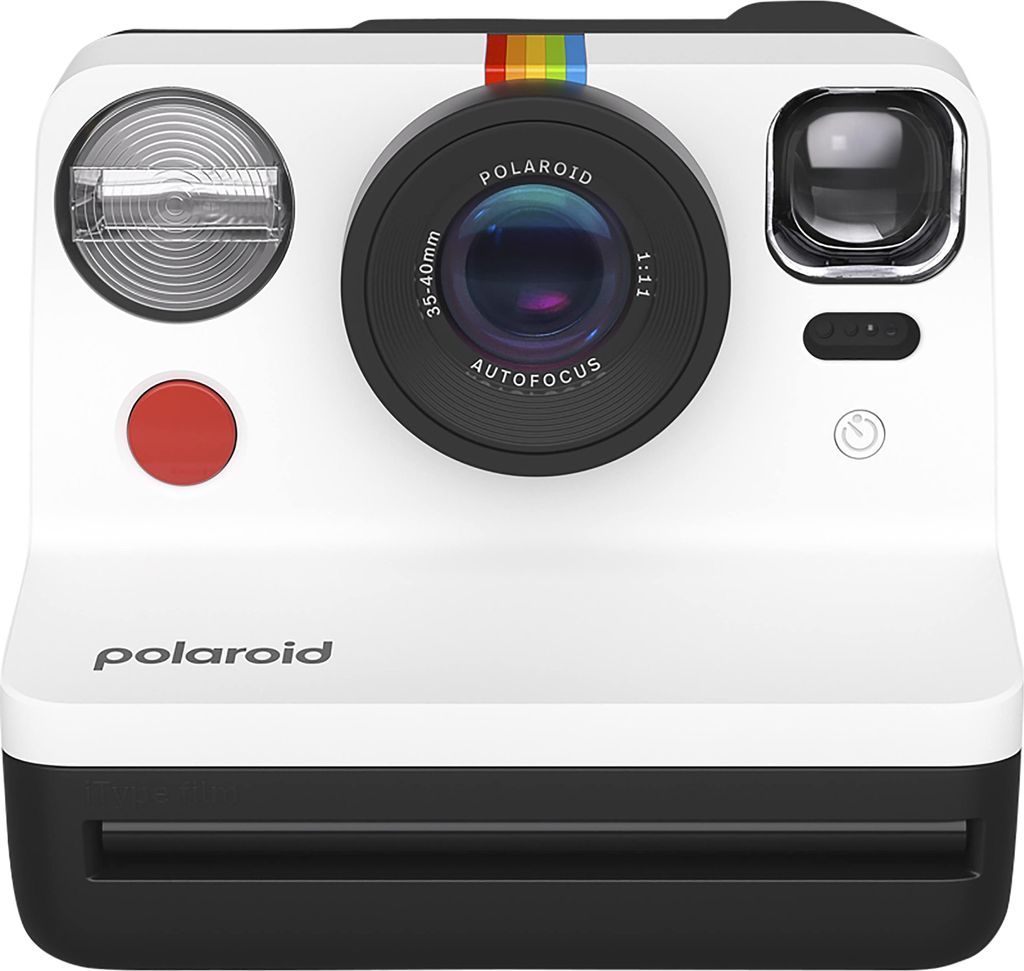 A front-on studio shot of a white Polaroid instant camera with a black base and a rainbow stripe above the lens.