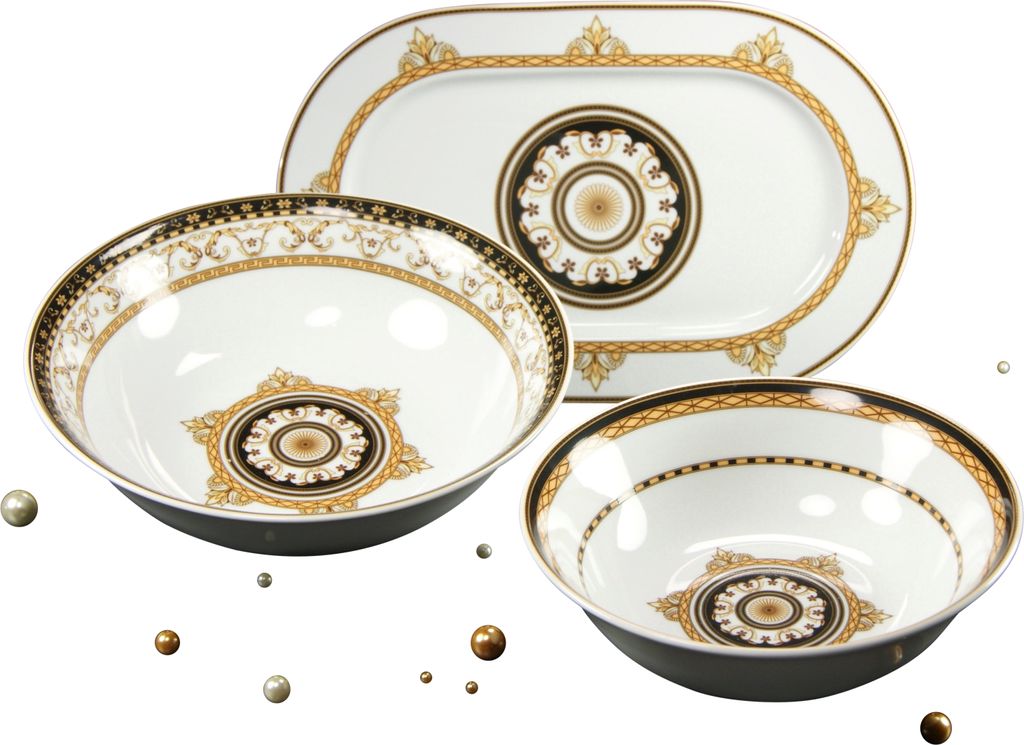 A set of three serving dishes with ornate gold and black patterns on a white background.
