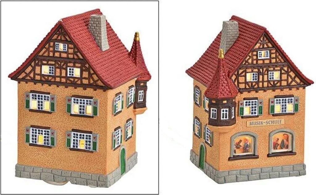 Two views of a ceramic house decoration, likely a Christmas village piece, designed to look like a schoolhouse.