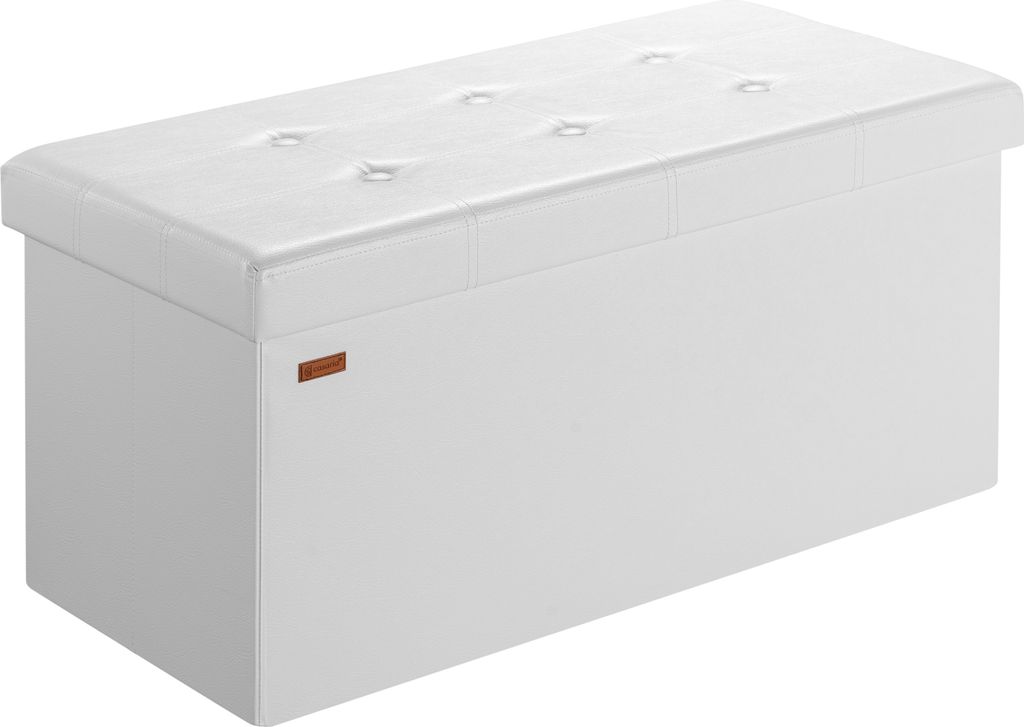 A white upholstered storage bench with a tufted lid.
