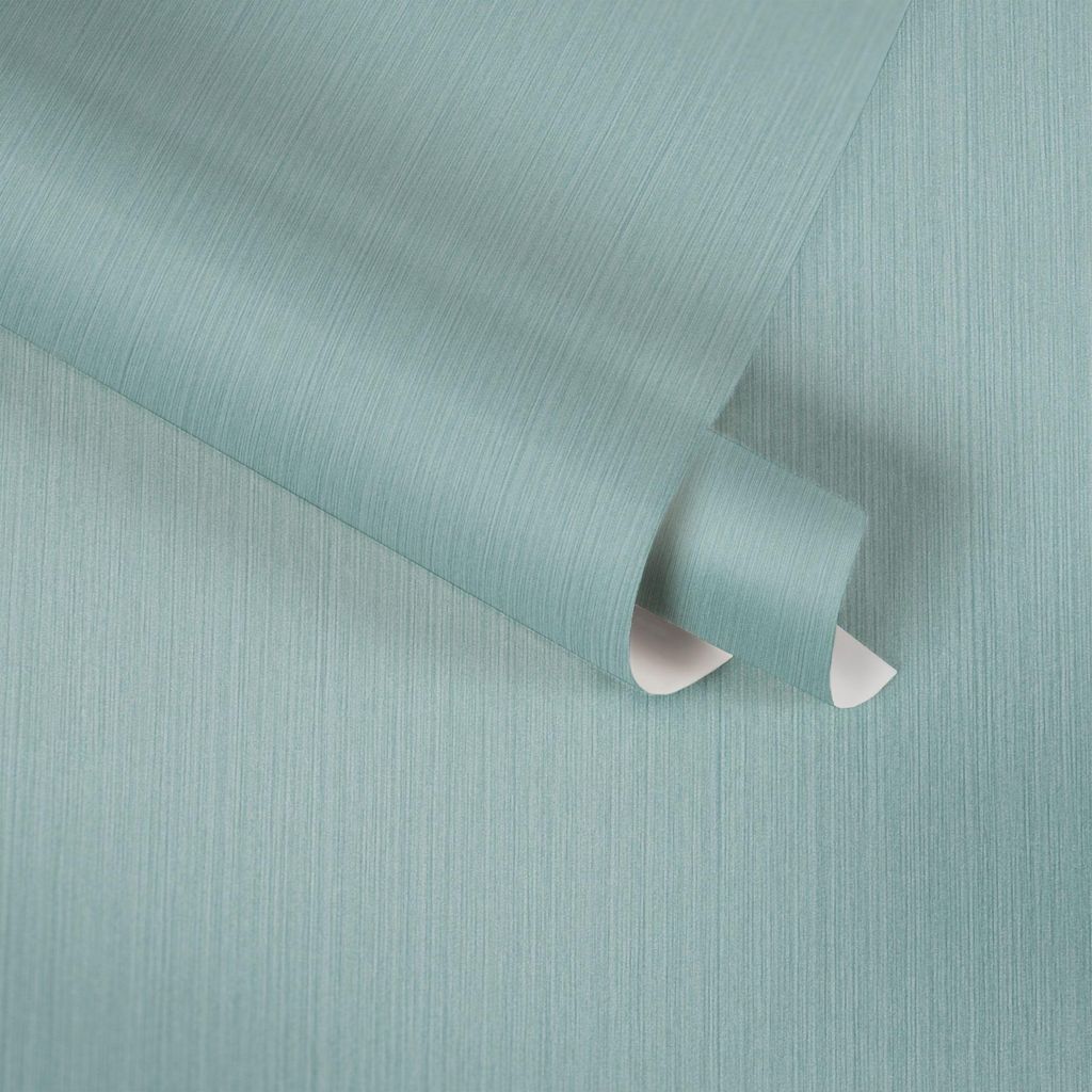 A roll of teal textured wallpaper is shown, with a portion unrolled.