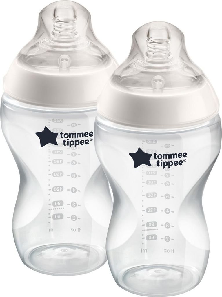 Two clear baby bottles with white caps and measurement markings.
