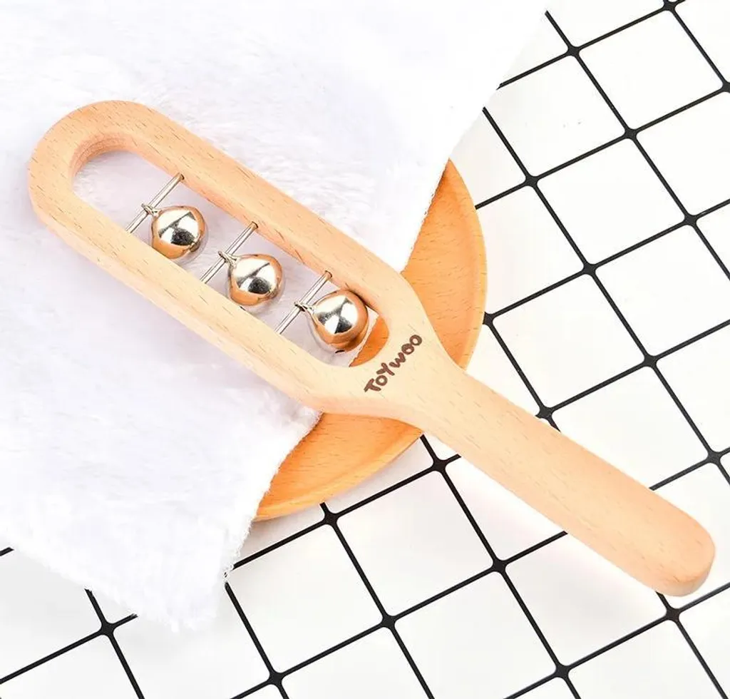 Hochet en bois Montessori : fini les jouets bruyants en plastique !