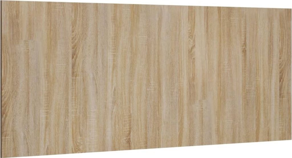 A flat lay image of a wooden headboard with a light wood grain pattern.