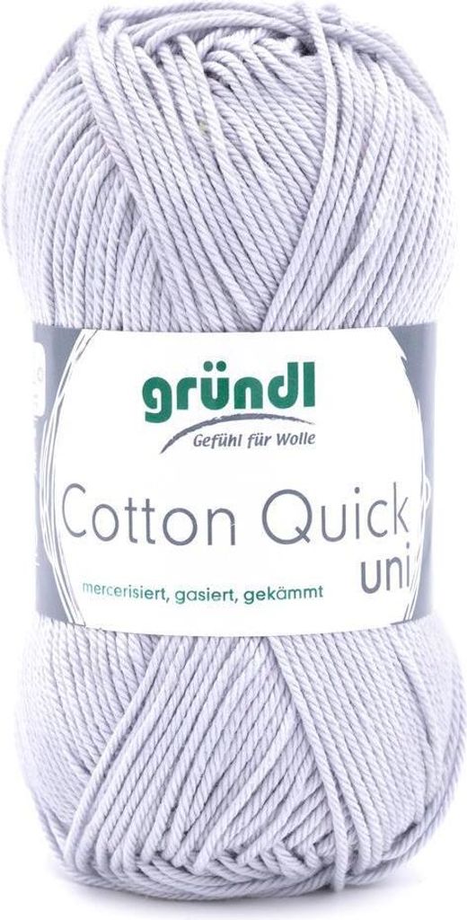 A ball of grey yarn with a label.