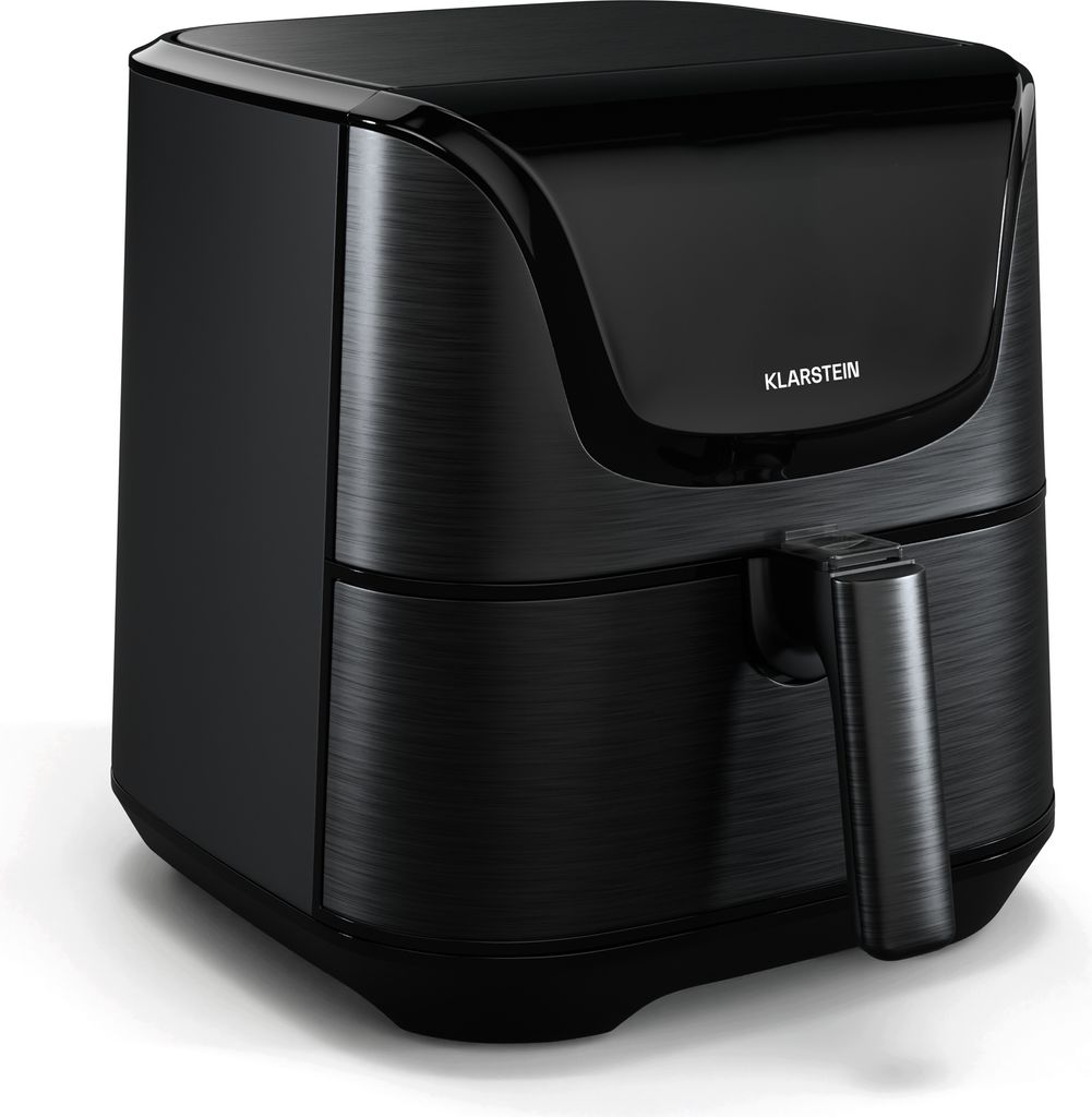 A black air fryer is shown from a three-quarter angle against a white background.