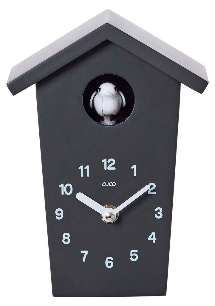 A black cuckoo clock with a white bird and white clock hands and numbers.