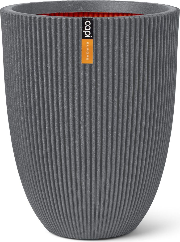 A dark gray planter with vertical ribbed texture and a red interior.