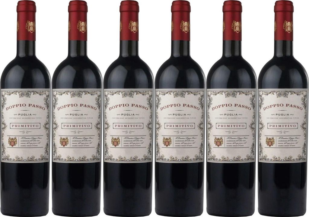 Six bottles of red wine are lined up against a white background.