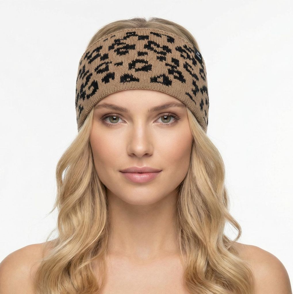 A woman wearing a leopard print headband.