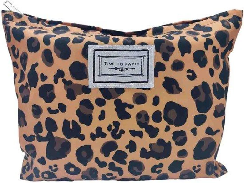 Trousse de voyage léopard pour organiser vos produits de beauté