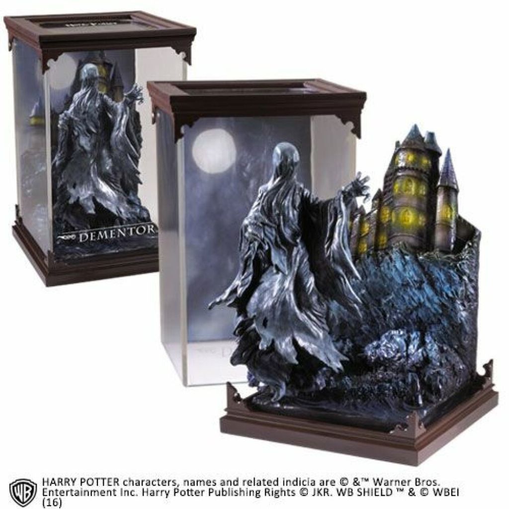 A diorama of a Dementor figure with Hogwarts Castle in the background, displayed in a clear case.