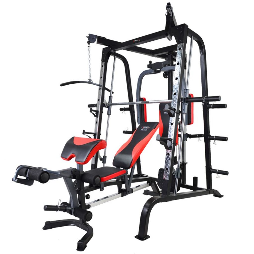A multi-gym fitness machine with various attachments and padded seats, shown against a white background.