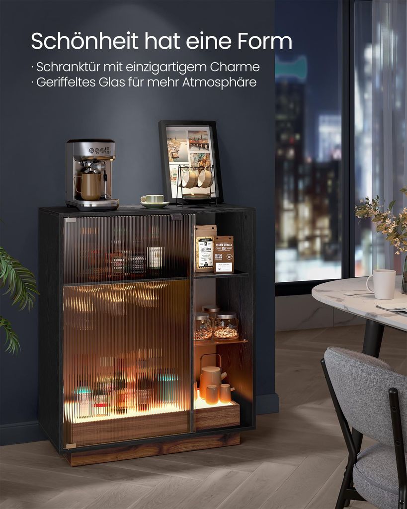 A dark, modern interior with a cabinet filled with bottles and jars, illuminated by soft lighting. A table and chair are visible in the background.