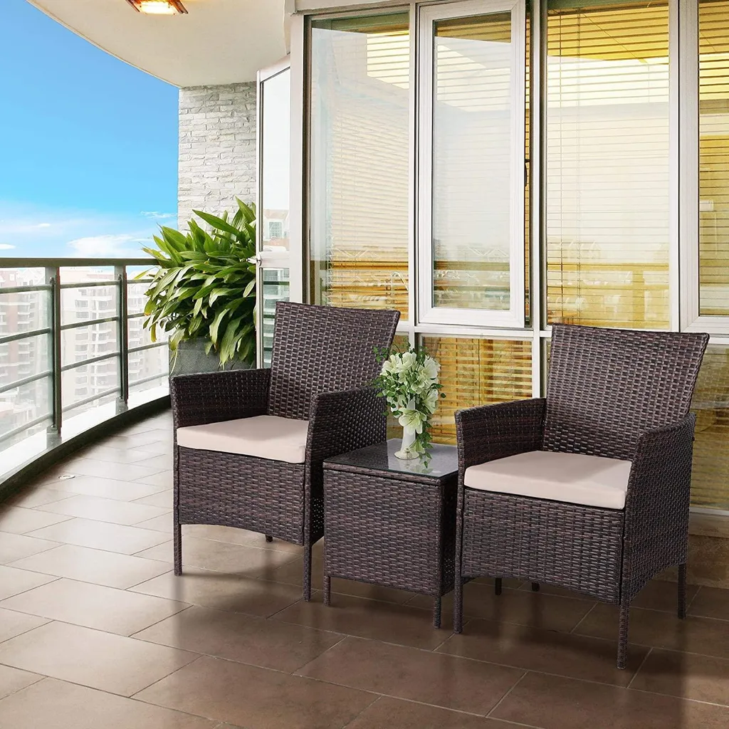 Mobilier de terrasse en rotin Radical : ensemble table et deux fauteuils