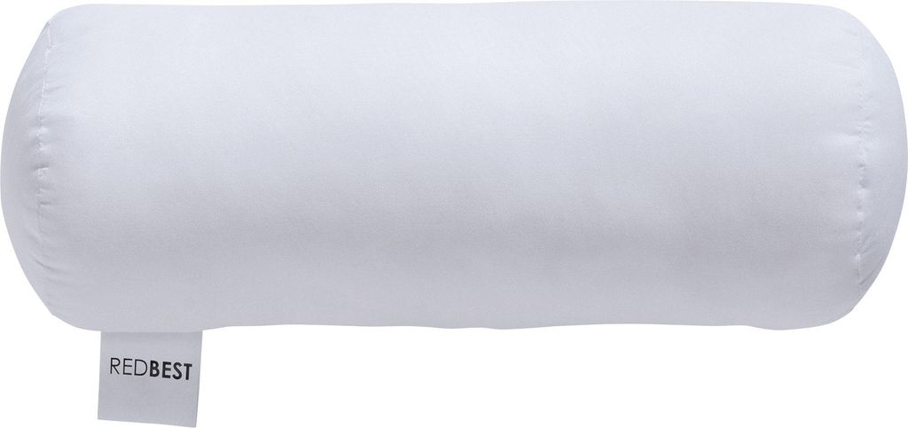 A white bolster pillow with a tag.