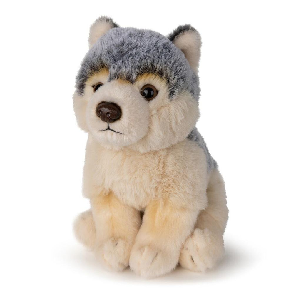 A plush toy wolf is sitting on a white background.