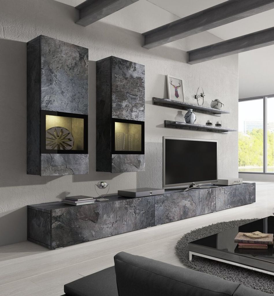A modern living room with a wall-mounted entertainment unit and fireplace.