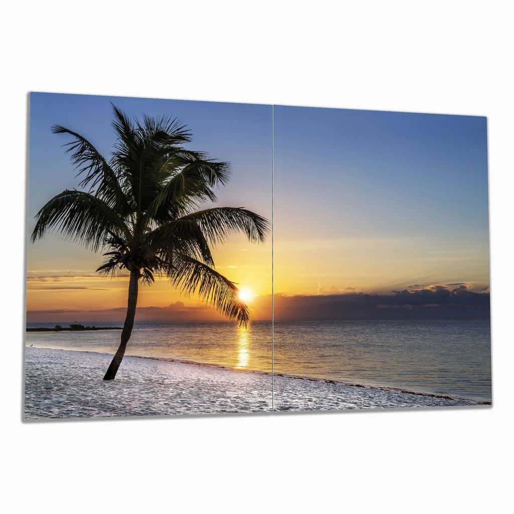 Wallario Herdabdeckplatte aus Glas, Größe 80 x 52 cm 2-teilig, Motiv Palme am Strand - Sonnenuntergang über dem Meer