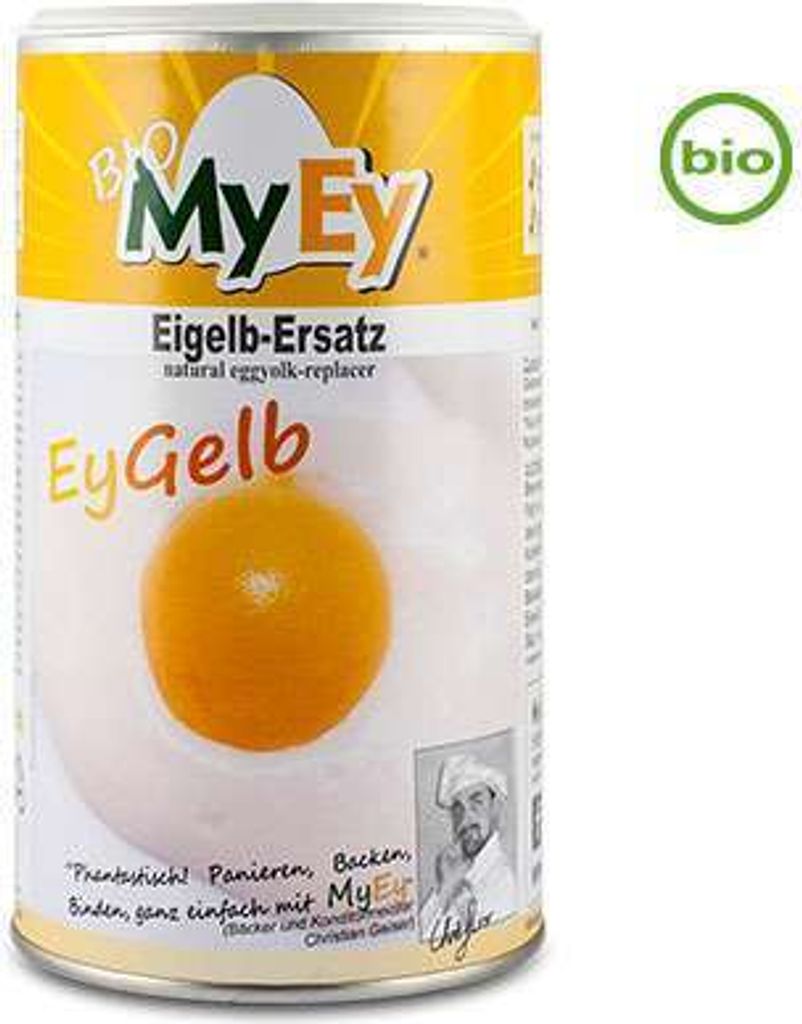 A can of MyEy EyGelb, a vegan egg yolk substitute, is shown against a white background. The can features bright yellow and white branding with images of an egg yolk and a chef.