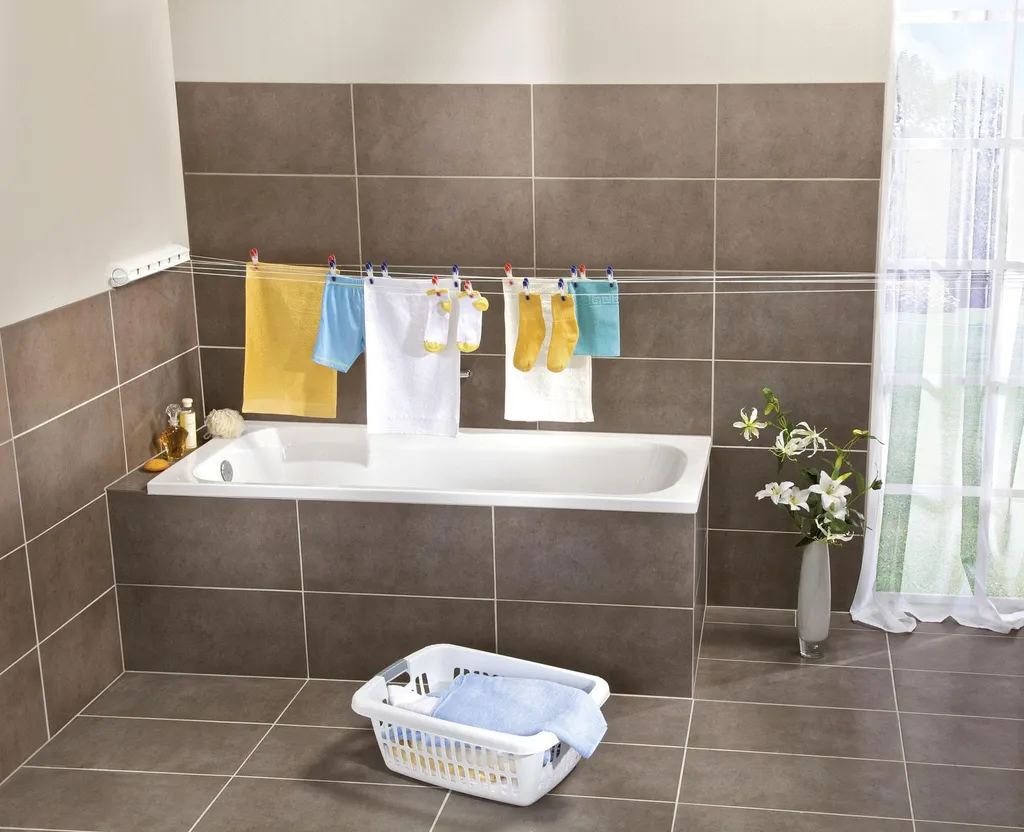Sèche-linge mural extensible Rollfix 210 blanc pour un gain de place - 5