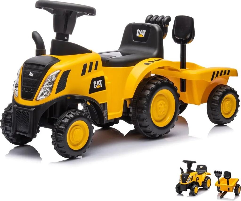 A yellow CAT tractor ride-on toy with a trailer, shown from a side-front angle.