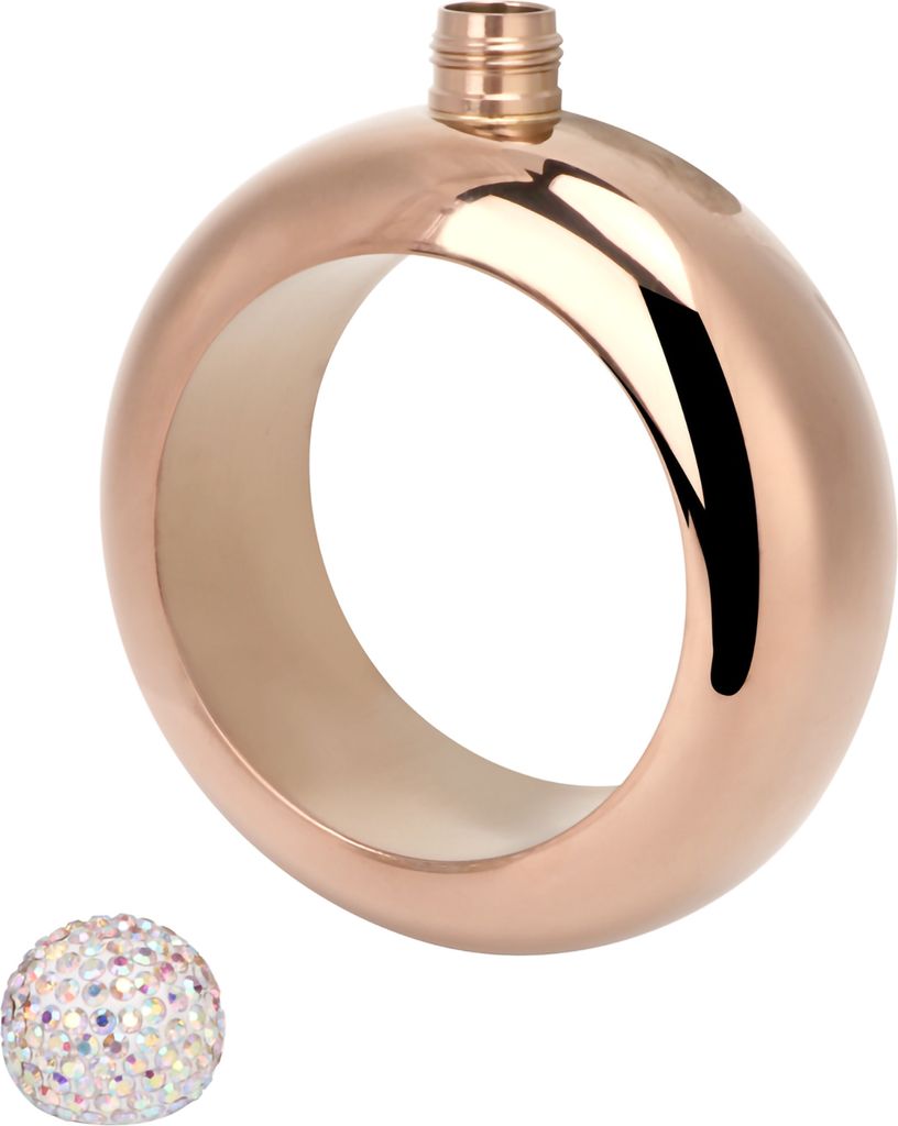 A rose gold colored flask shaped like a bracelet with a decorative cap next to it.