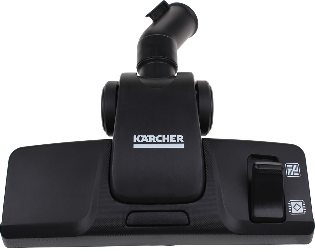 A close-up studio shot of a black vacuum cleaner floor head.