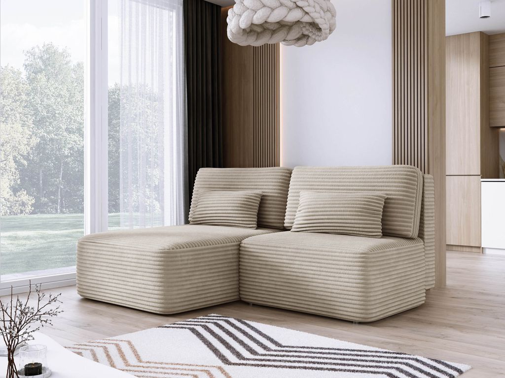 A modern living room with a beige sectional sofa in front of a large window.