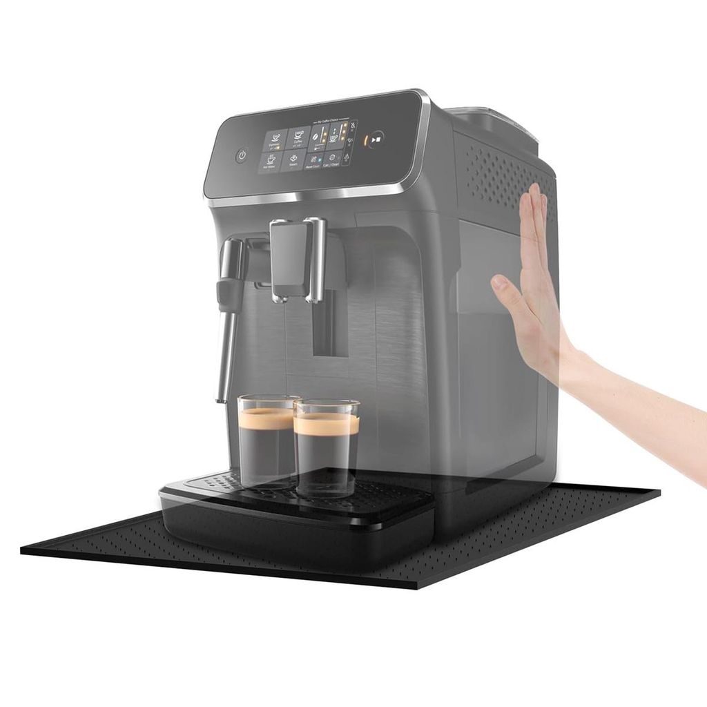 A coffee machine with two cups of espresso on a black mat, with a semi-transparent hand reaching towards the side of the machine.