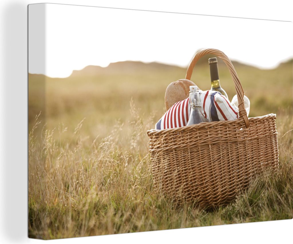 OneMillionCanvasses - Leinwandbilder - Bild auf Leinwand Wandbild Leinwandbild Gefüllter Picknickkorb im Gras, 90x60 cm, Kunstdruck Wandkunst Ge...