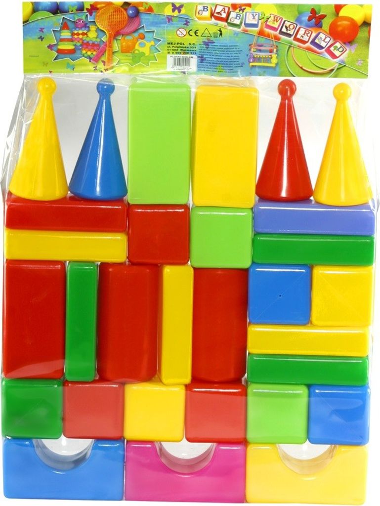 A collection of colorful building blocks and cone-shaped pieces arranged in a castle-like structure, all enclosed in clear plastic packaging.