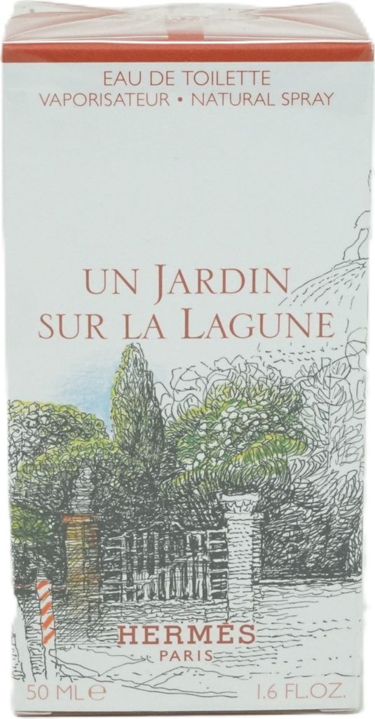 A close-up of a perfume box with an illustration of a garden scene.
