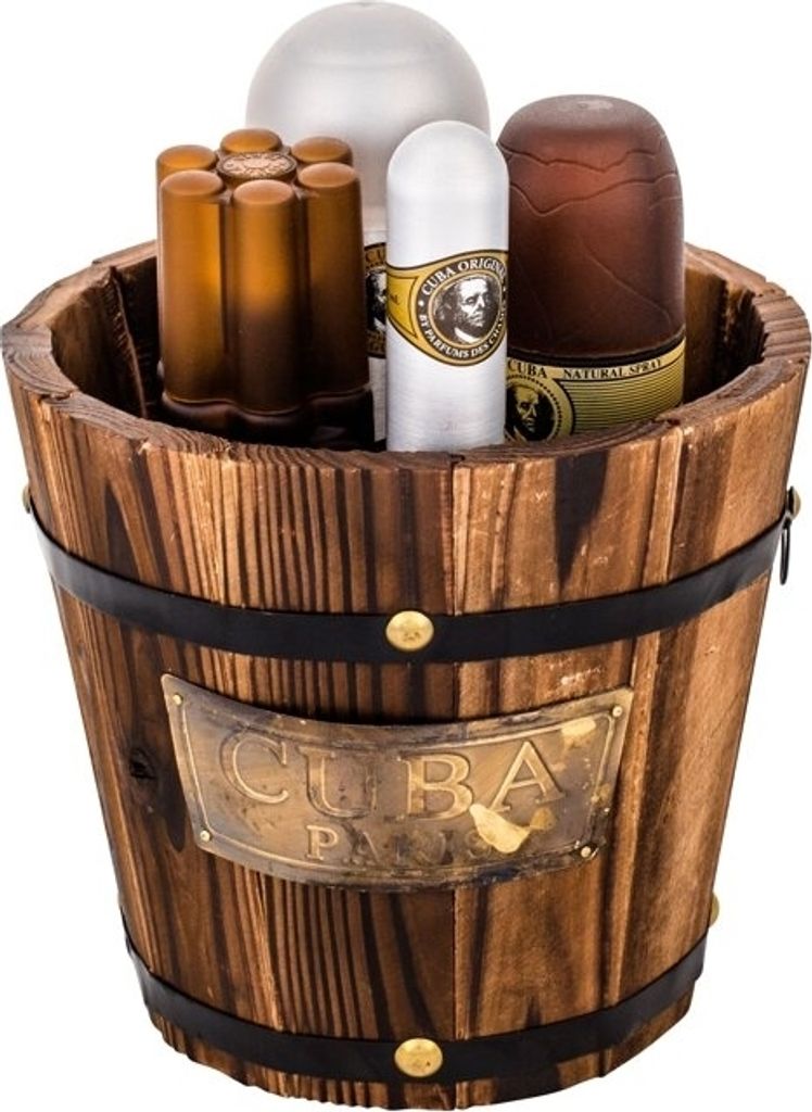 A wooden bucket filled with various items, including cigars and bottles, with a metal plaque on the front.