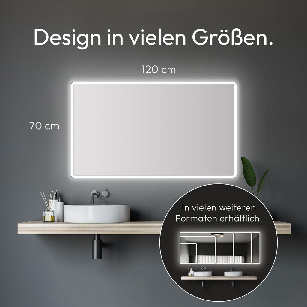 A bathroom vanity with a sink and a large LED mirror above it.