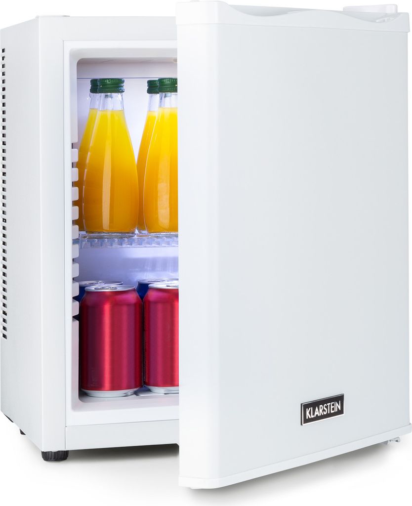 A white mini-refrigerator with the door open, containing two bottles of orange juice and two cans of soda.