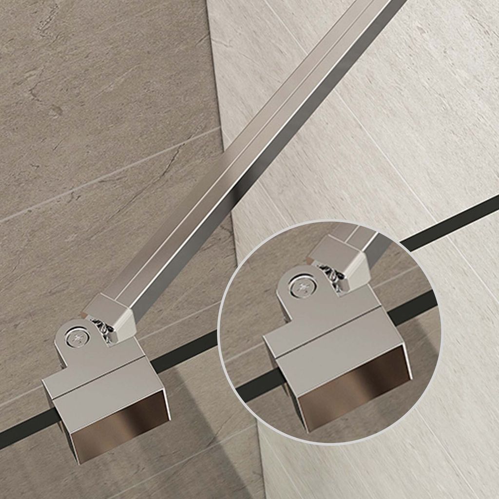 A close-up view of a metal shower support bar hinge mechanism attached to a shower wall.