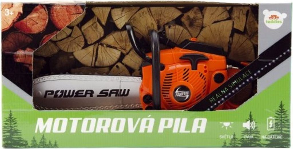 The image shows the packaging of a toy chainsaw, with a realistic depiction of cut logs in the background.