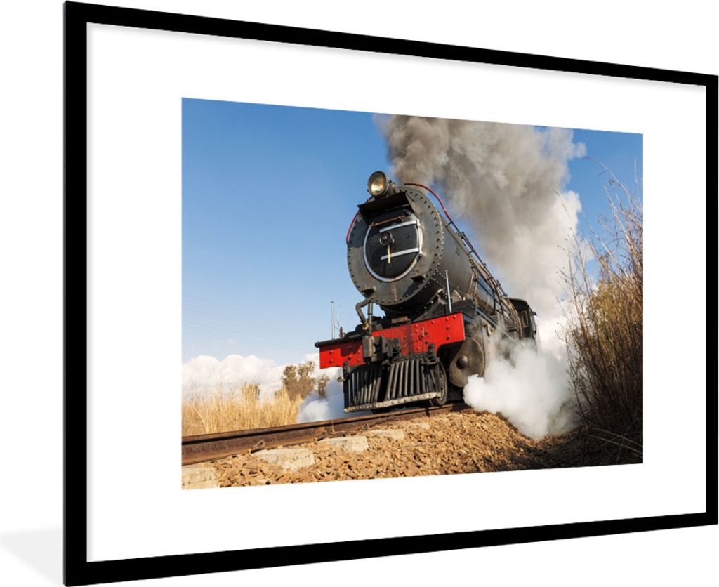 MuchoWow Gerahmtes Poster Ein dunkler Dampfzug an einem sonnigen Nachmittag in Südafrika 90x60 cm - Poster mit Schwarzem Bilderrahmen Wandposter...