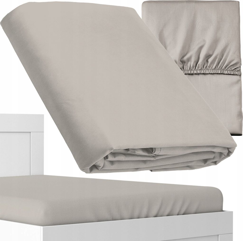 A folded fitted sheet is shown on top of a mattress, with a white headboard visible on the left.