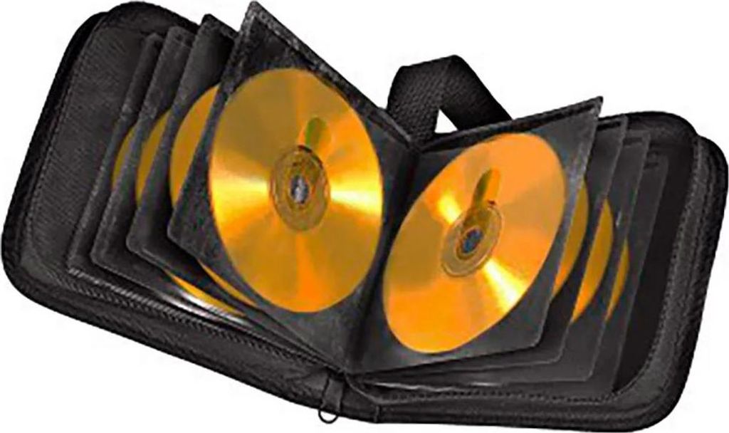 A black CD case filled with gold-colored CDs.