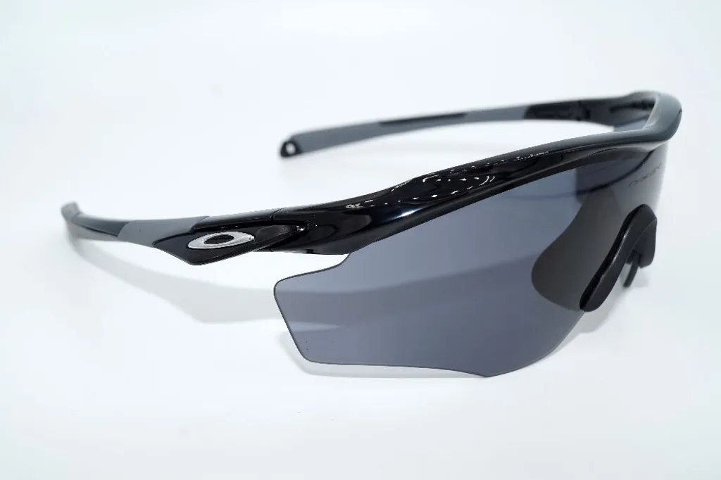 Lunettes Oakley OO9343 934301 avec Verres Polarisés et Monture Légère